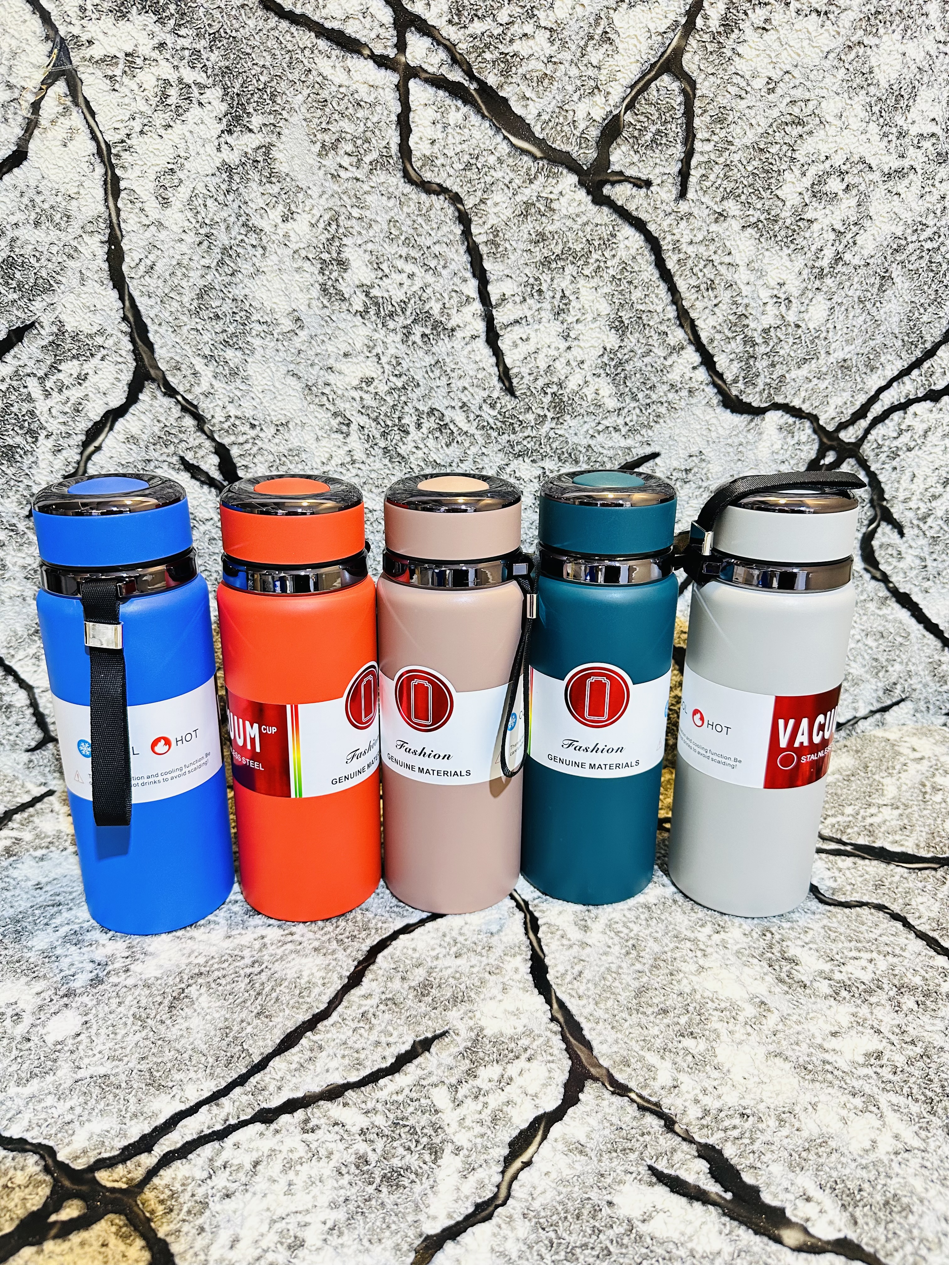 Vacuum insulated bottle with handle